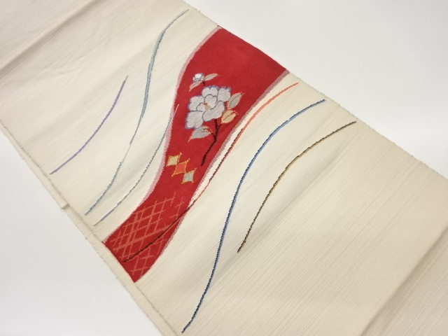 手織り紬曲線に花模様織出し名古屋帯